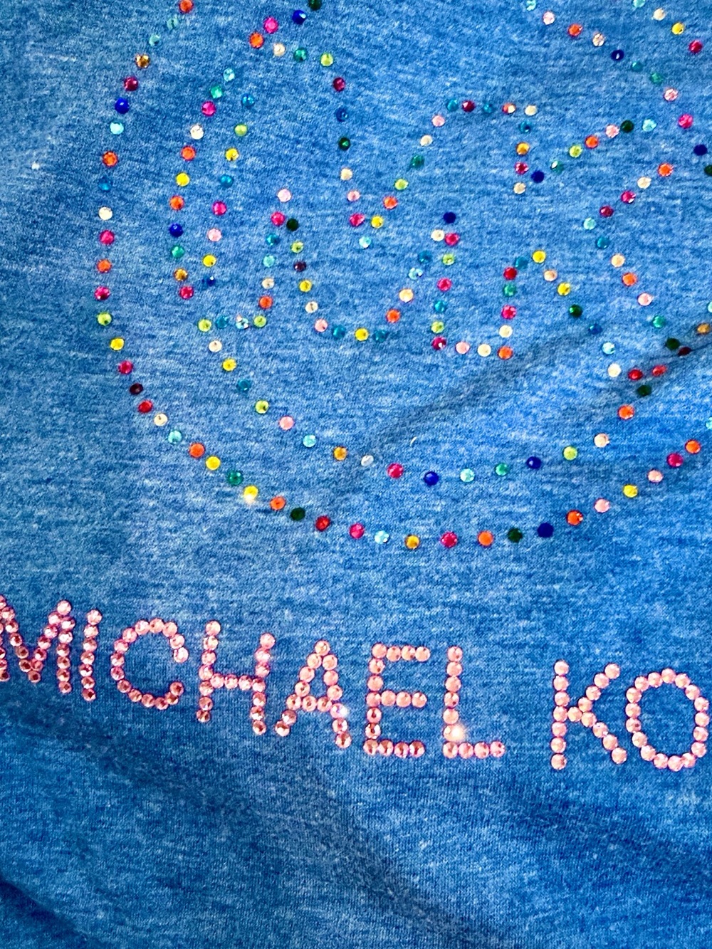 Handmade crystal MK Design on Blue V-Neck Tee Shirt. Great Ruffle puff sleeves.
